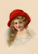 Sourire d'enfant sous un chapeau rouge